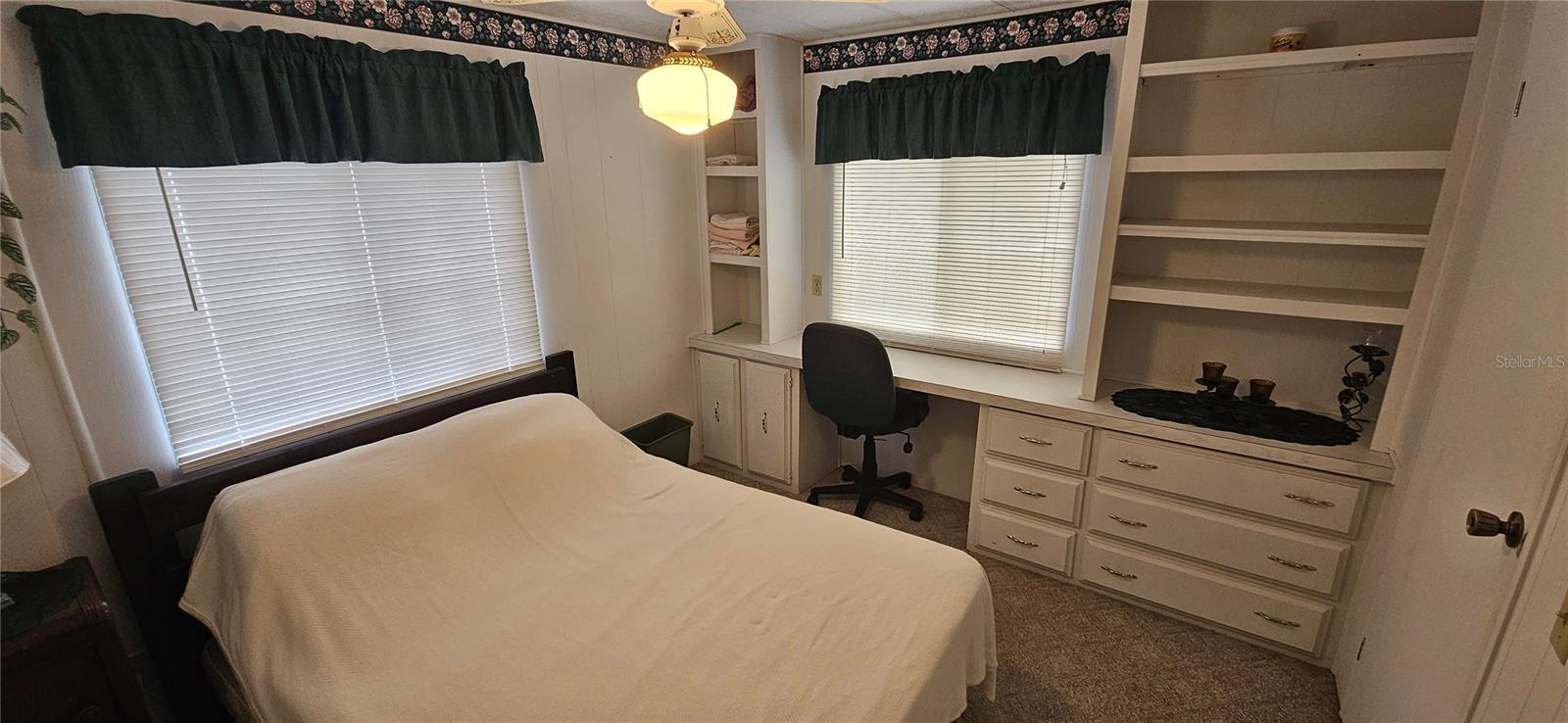 Bedroom 2 showing built ins