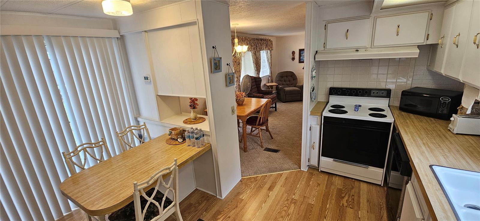 Kitchen showing table and sliding glass door