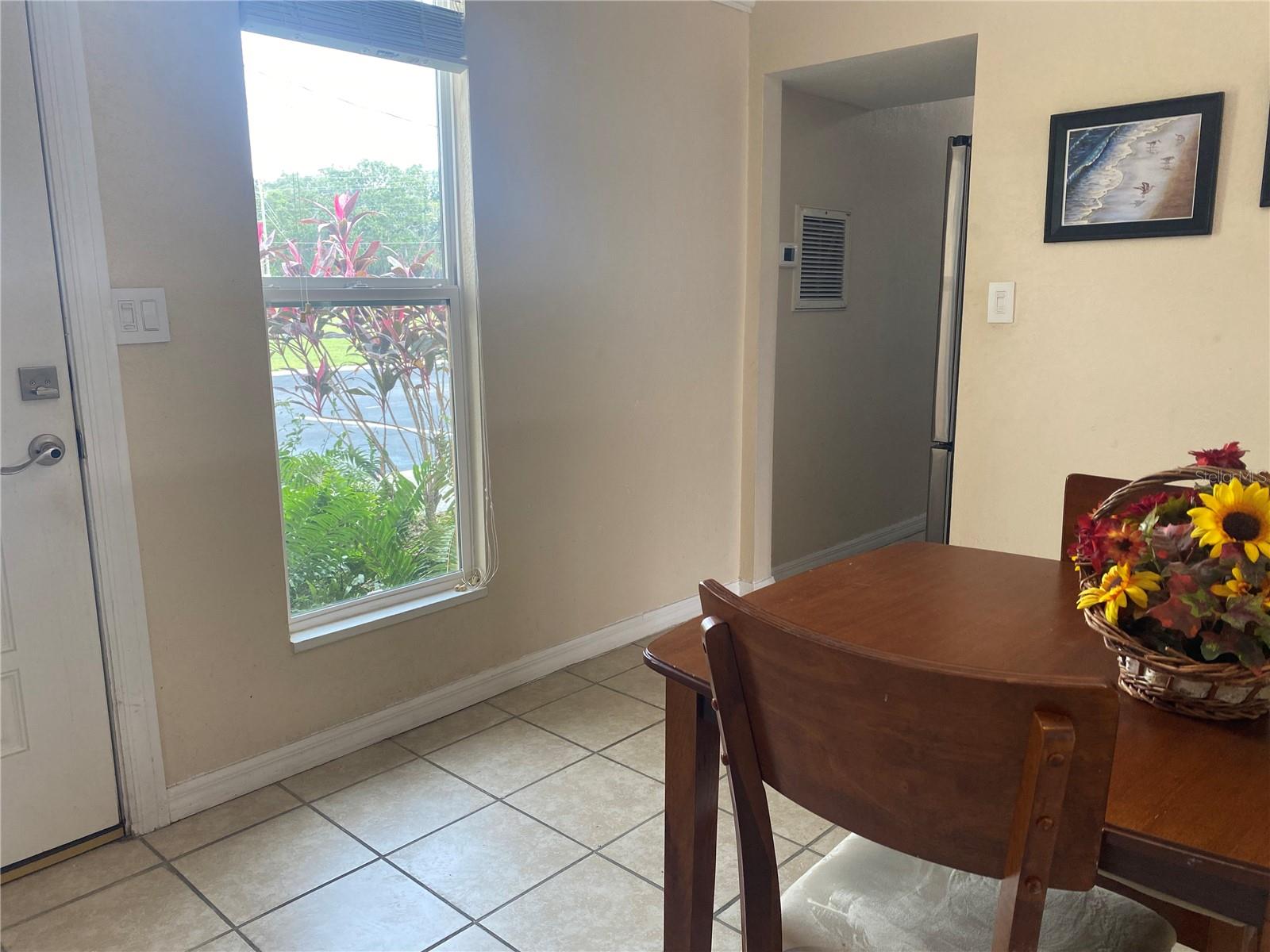 Dinette table is right off the kitchen.
