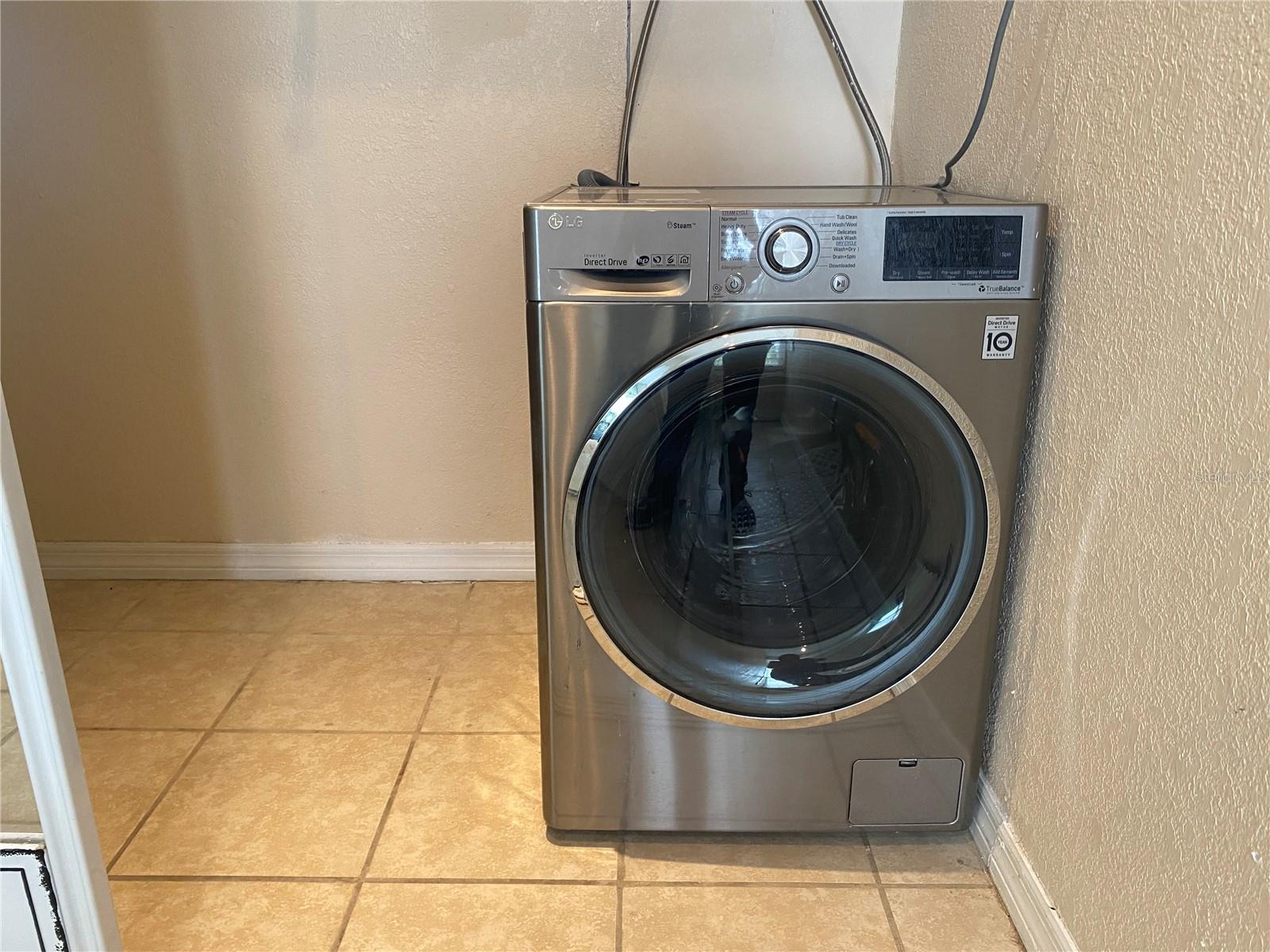 The combination washer/dryer appliance is located in the bedroom closet and will stay in the home and provides at home laundry instead of having to go to a laundromat.