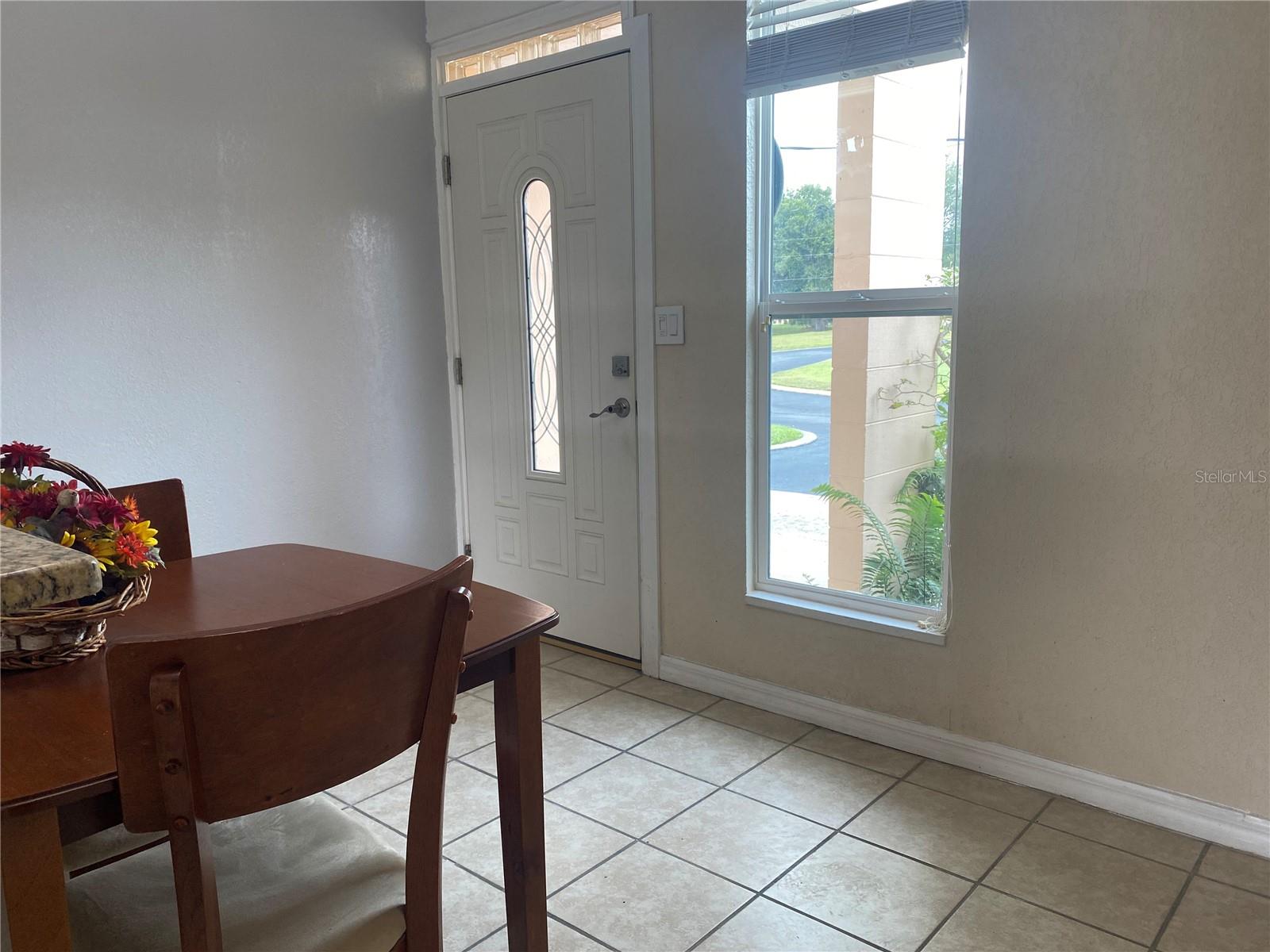 The front door has a lead glass insert and the home has new double pane windows.