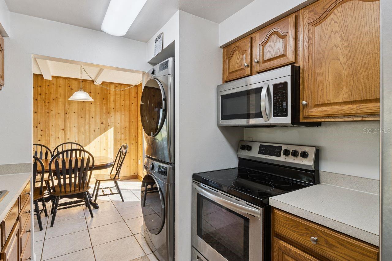 Fully equipped kitchen with full size washer & dryerr