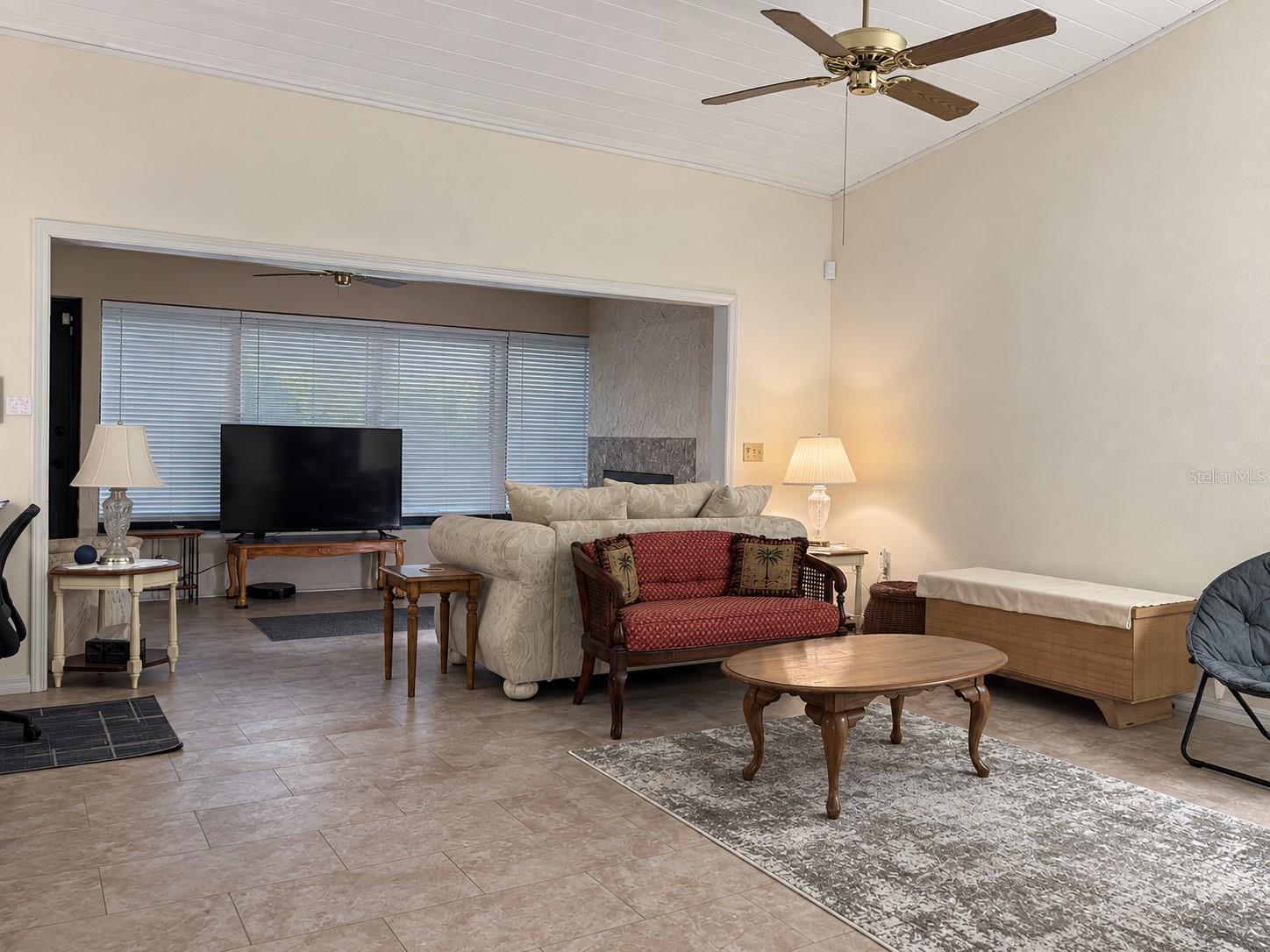 Living room facing Bonusroom and fireplace
