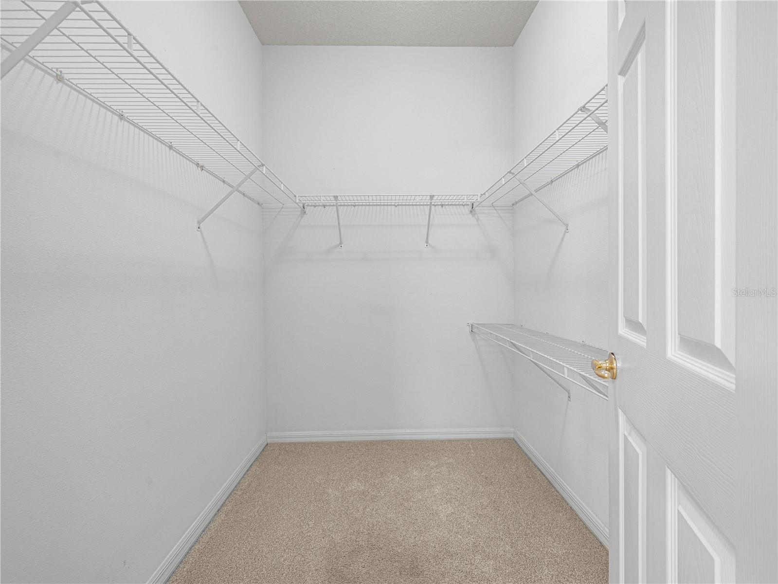 His/Her Walk In Closet in Primary Suite