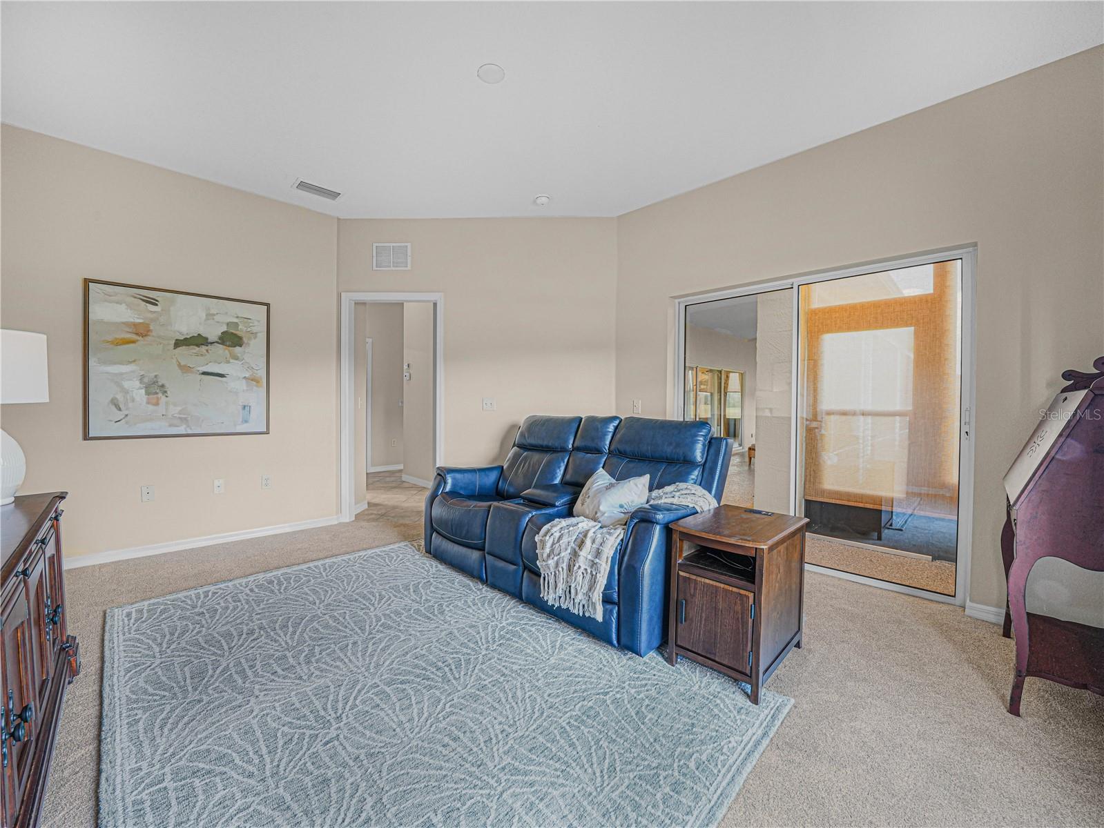 Den Area (Bed 3). Access to the Covered and Screened Florida Room.