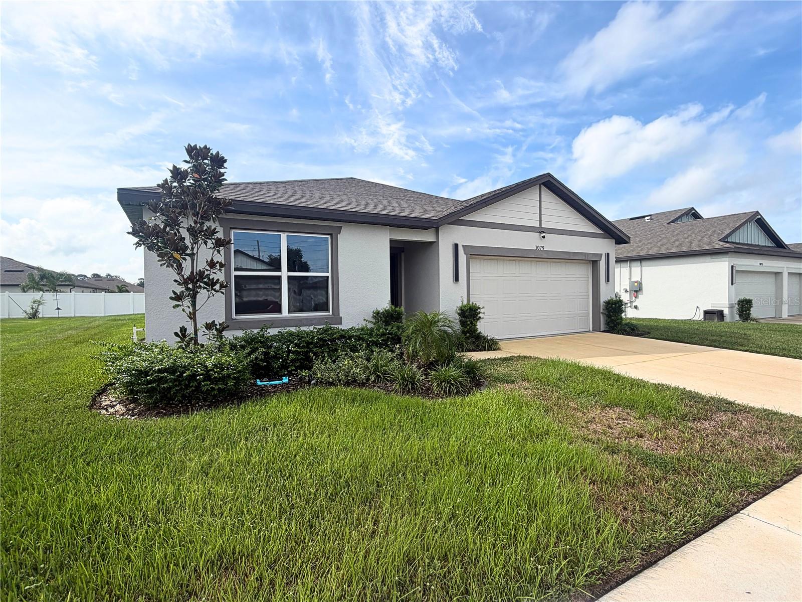 Two car garage and Florida friendly landscaping Two car garage and Florida friendly landscaping