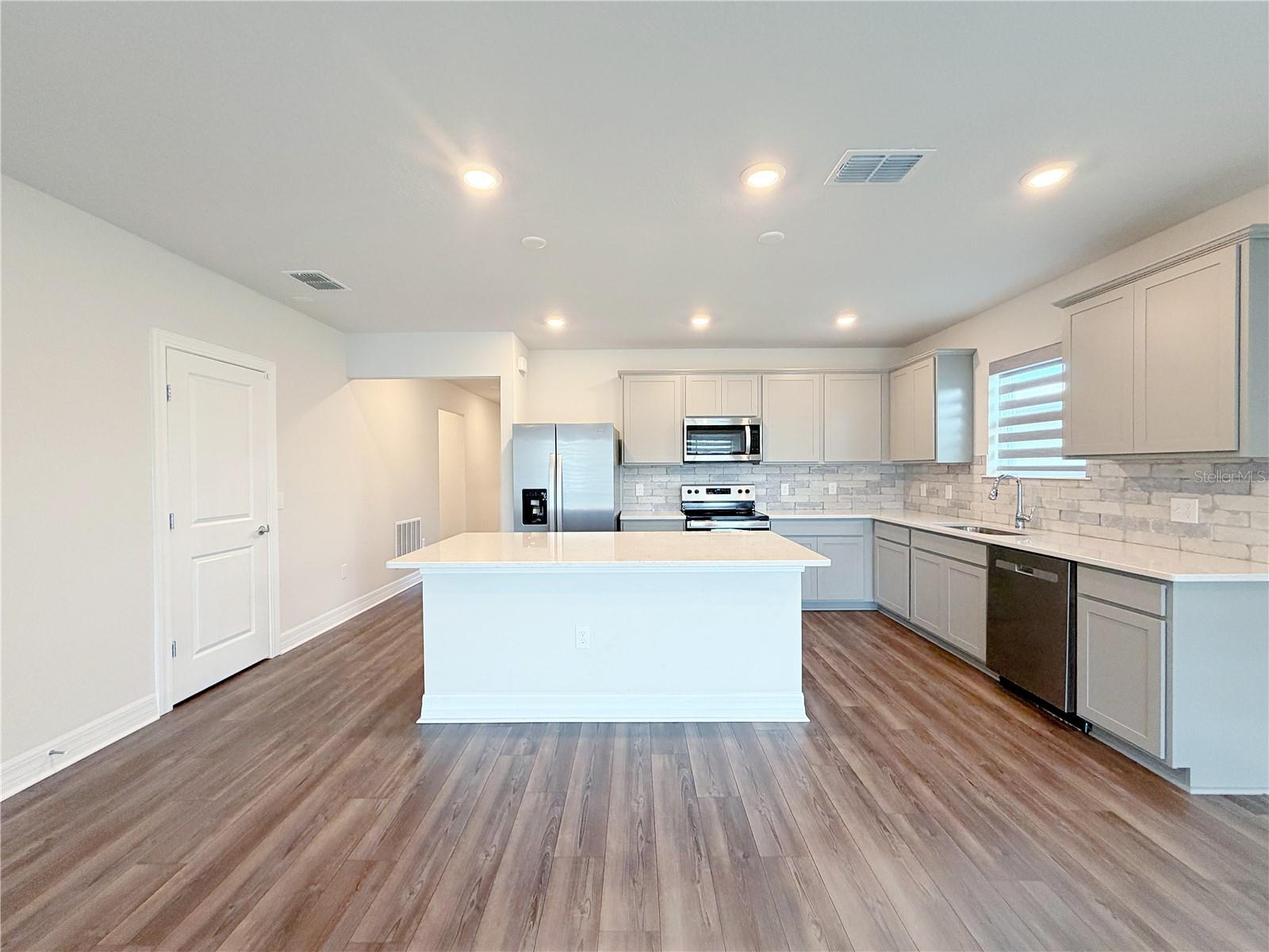 Large kitchen island with breakfast bar Large kitchen island with breakfast bar