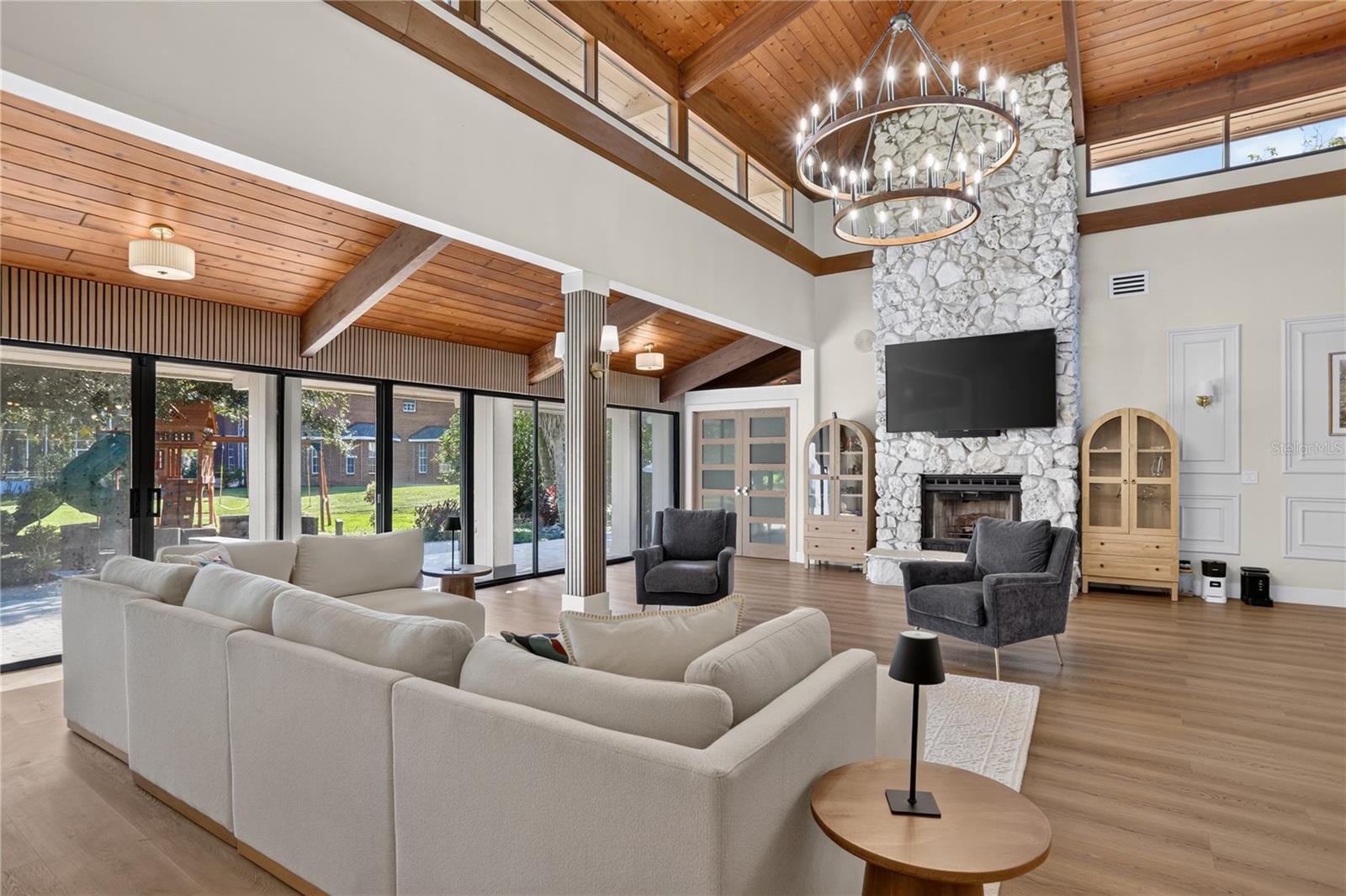 Living room with stoned fireplace