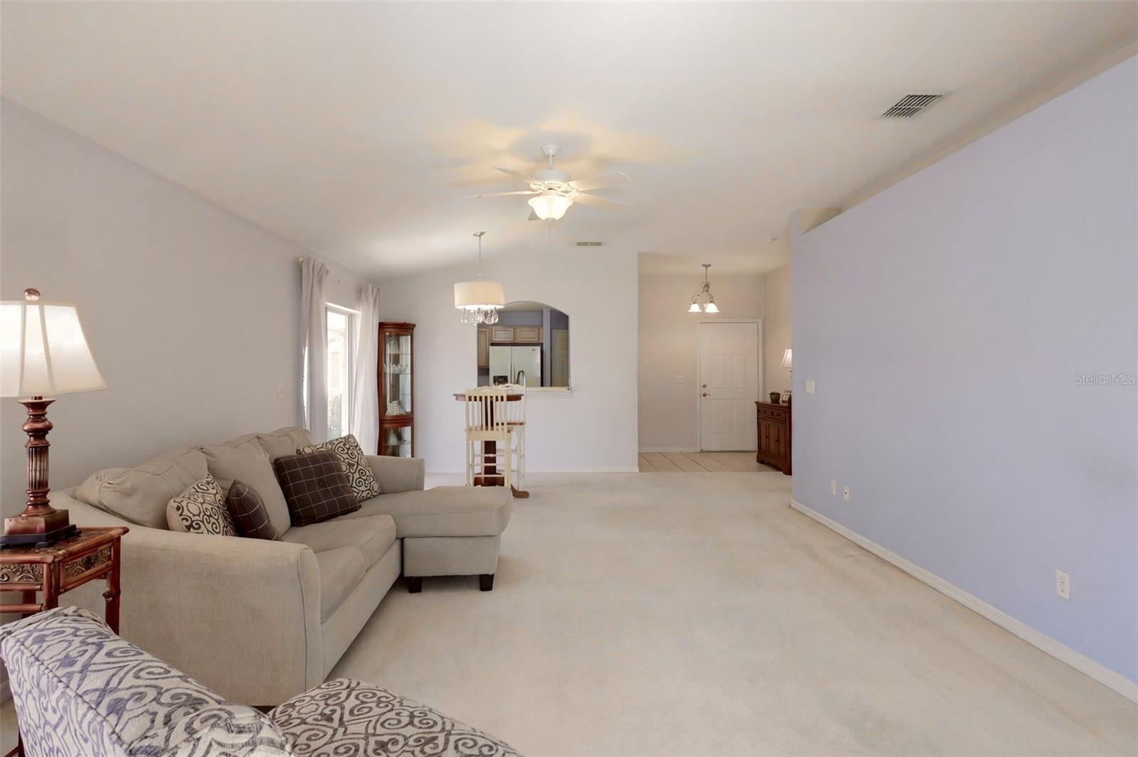 Living room features a decorative planter shelf