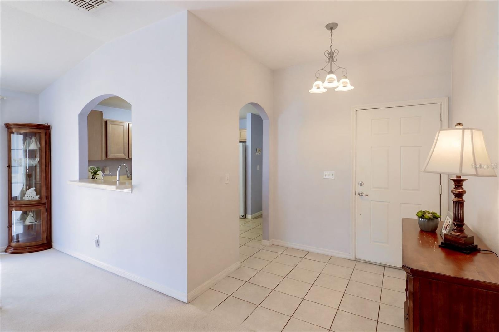 Foyer features tile flooring