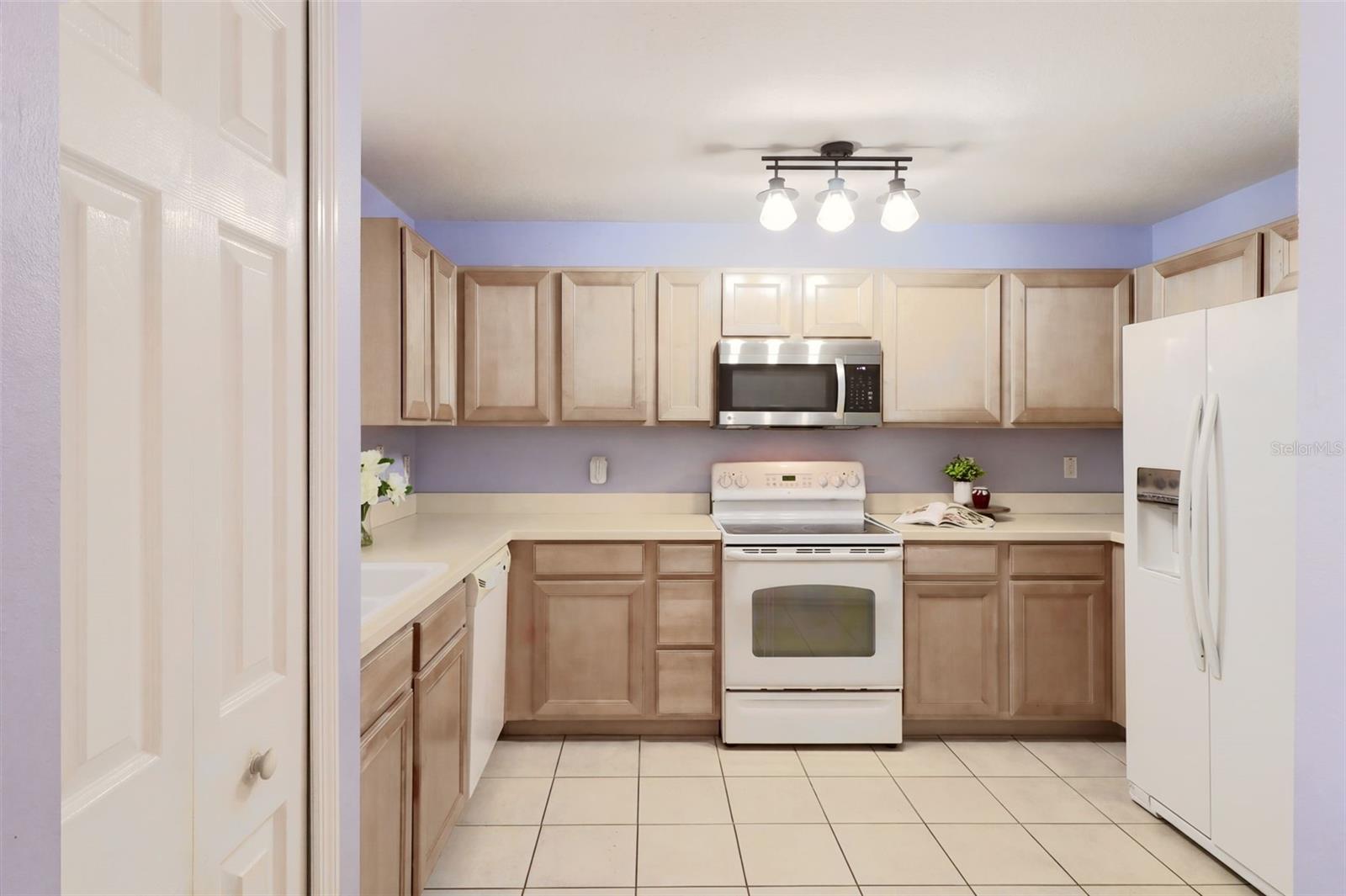 Kitchen features a closet pantry