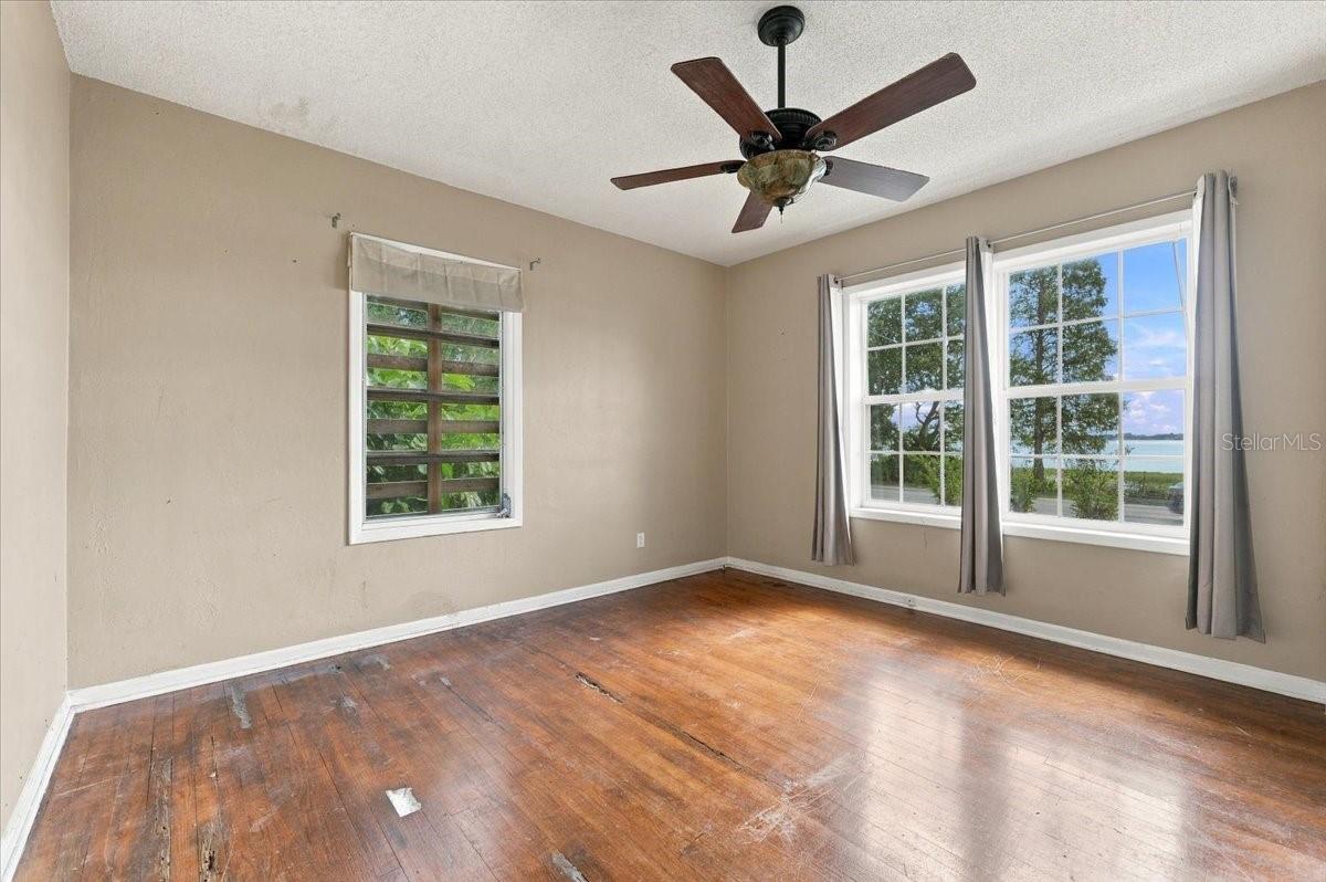 Primary Bedroom has lakefront views