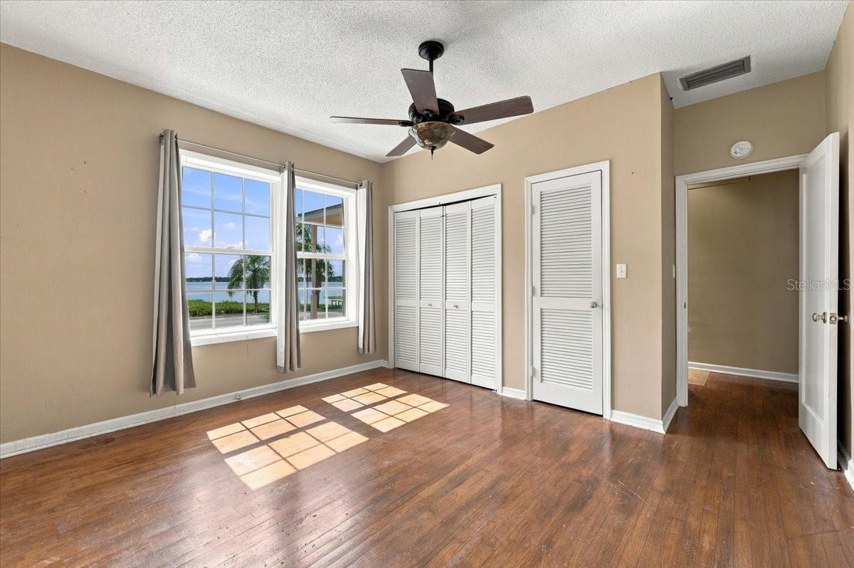 Primary Bedroom has lakefront views