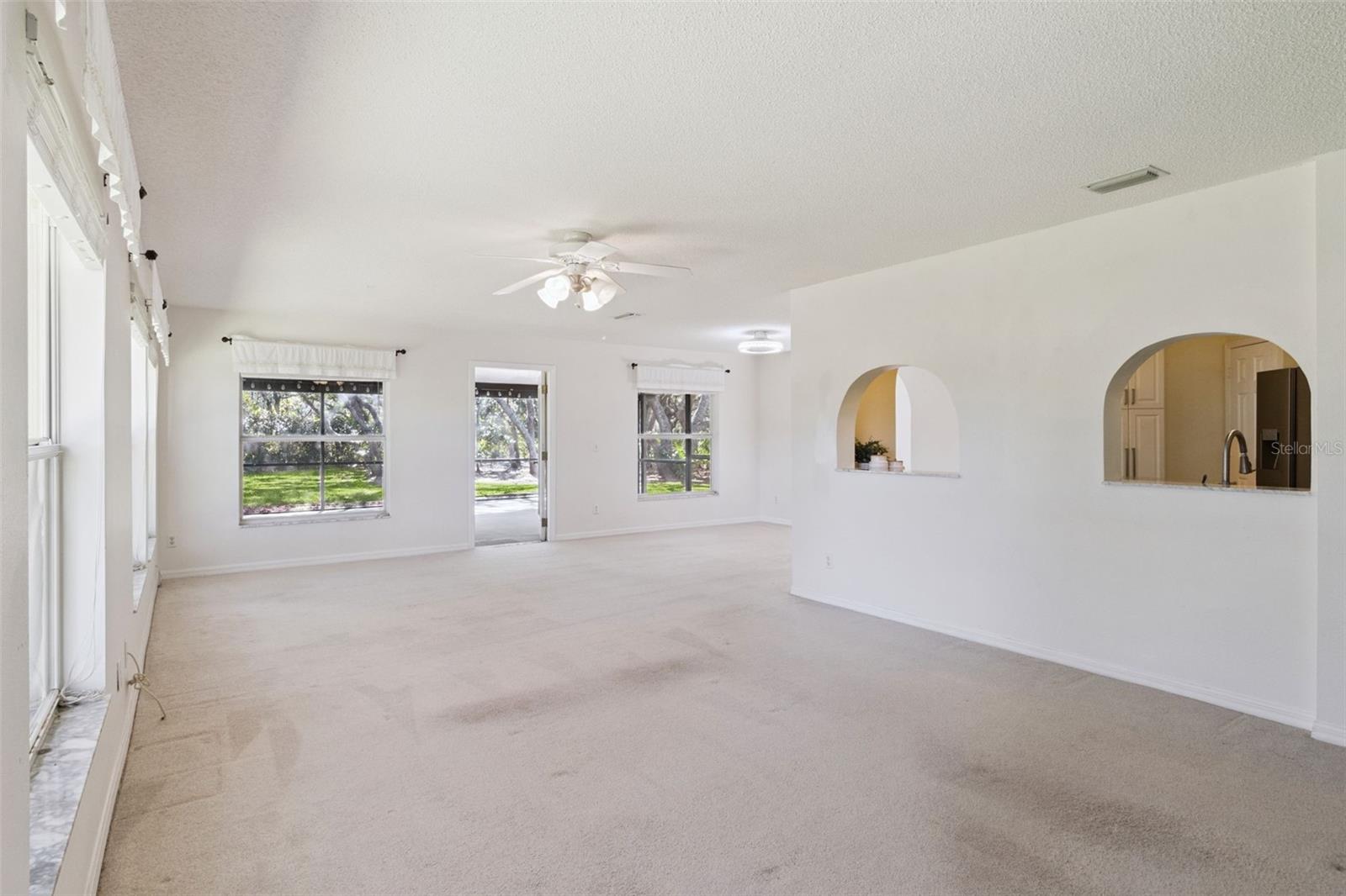 Family Room offers access in to the Screened-in Lanai