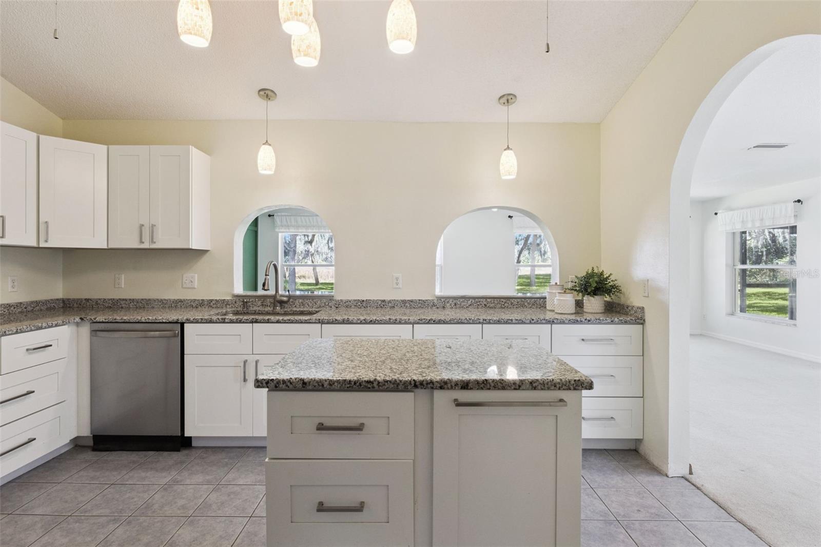 Center Island features Granite Countertops