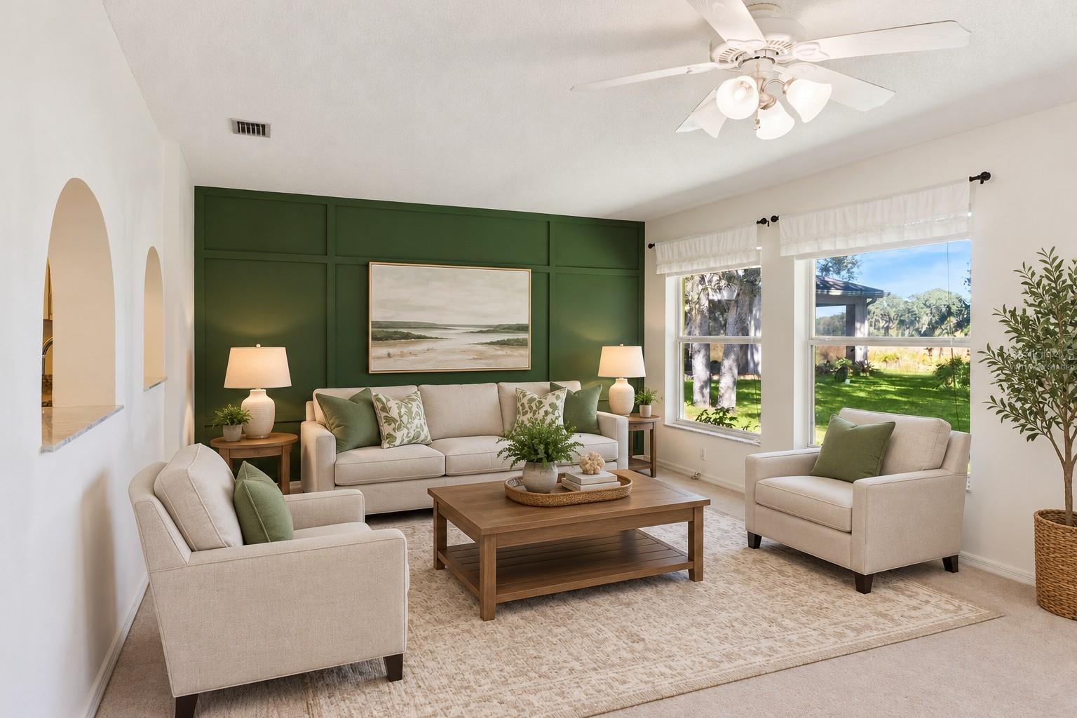 Virtually Staged Generously sized Family Room featuring Lovely Pond Views