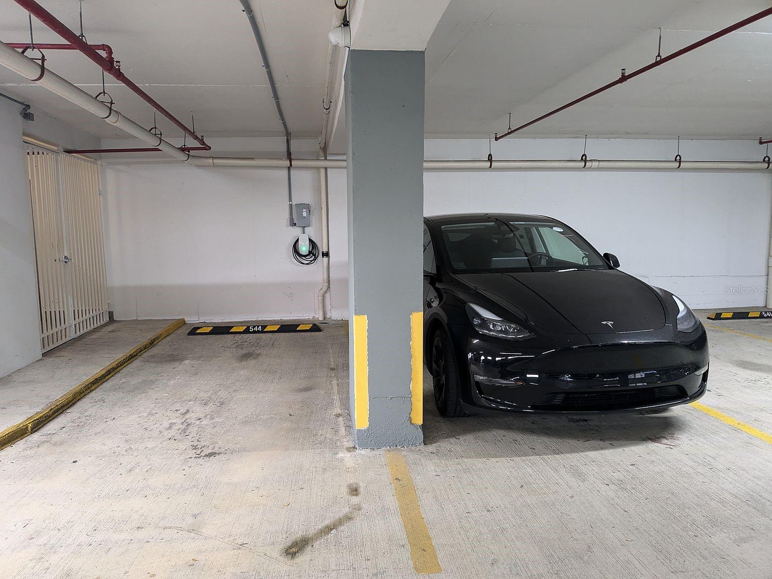 Parking  assigned space with EV charger (included)