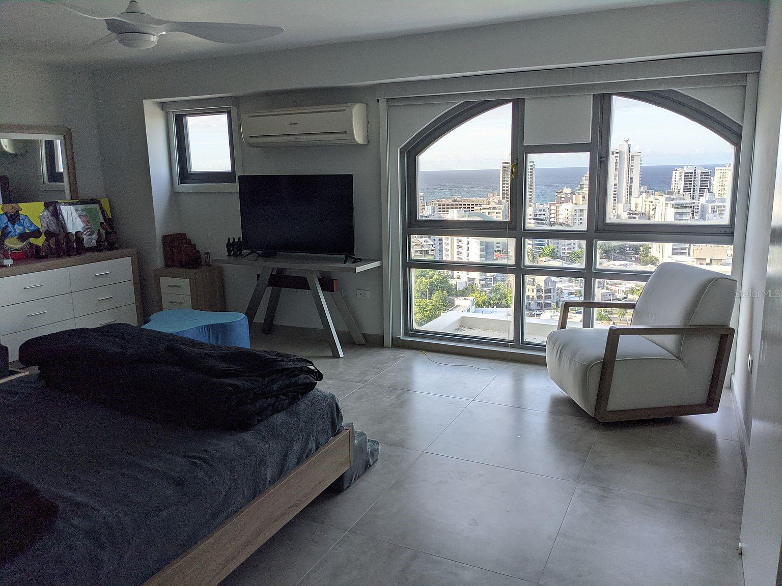 Bedroom 2  arched windows with ocean view