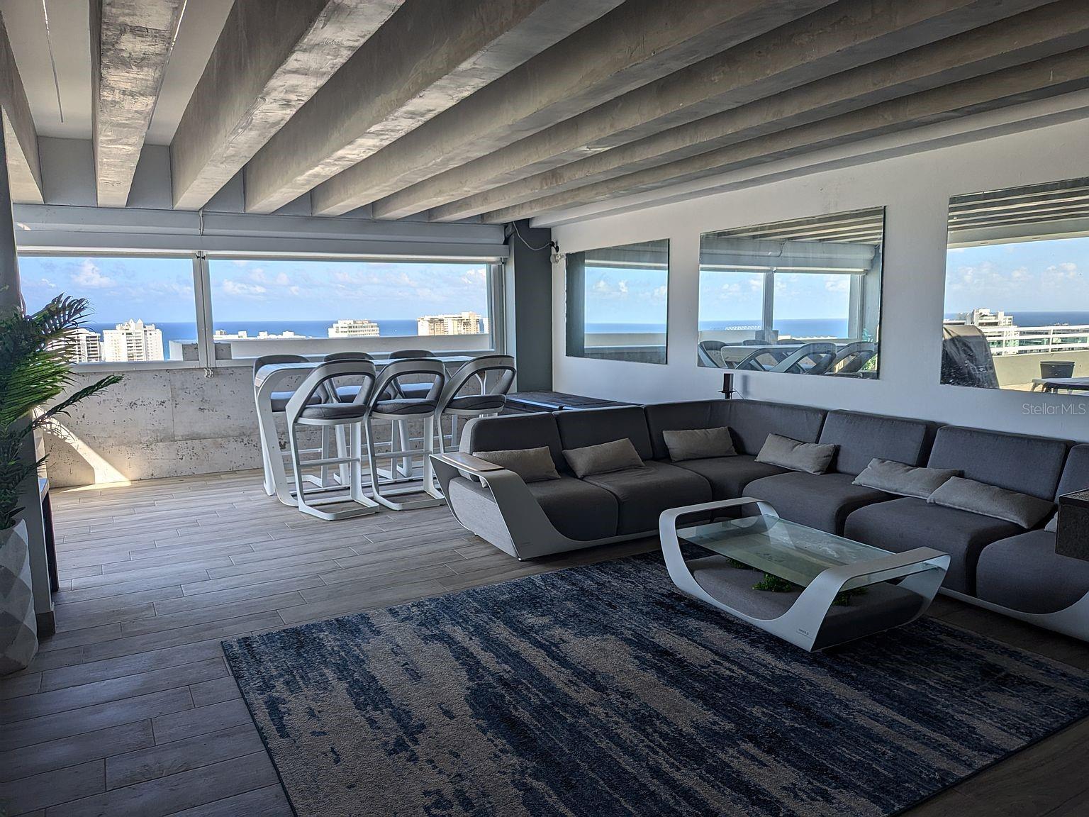Covered terrace lounge  ocean views