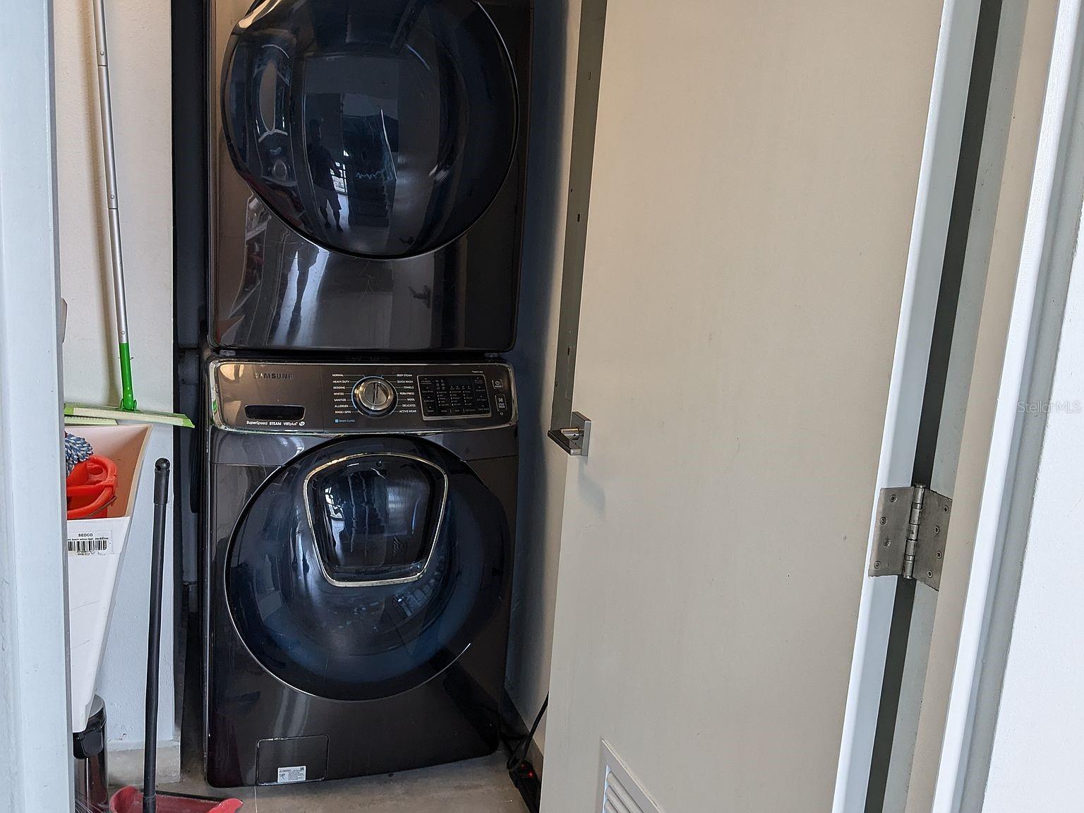 Laundry  stacked washer and dryer