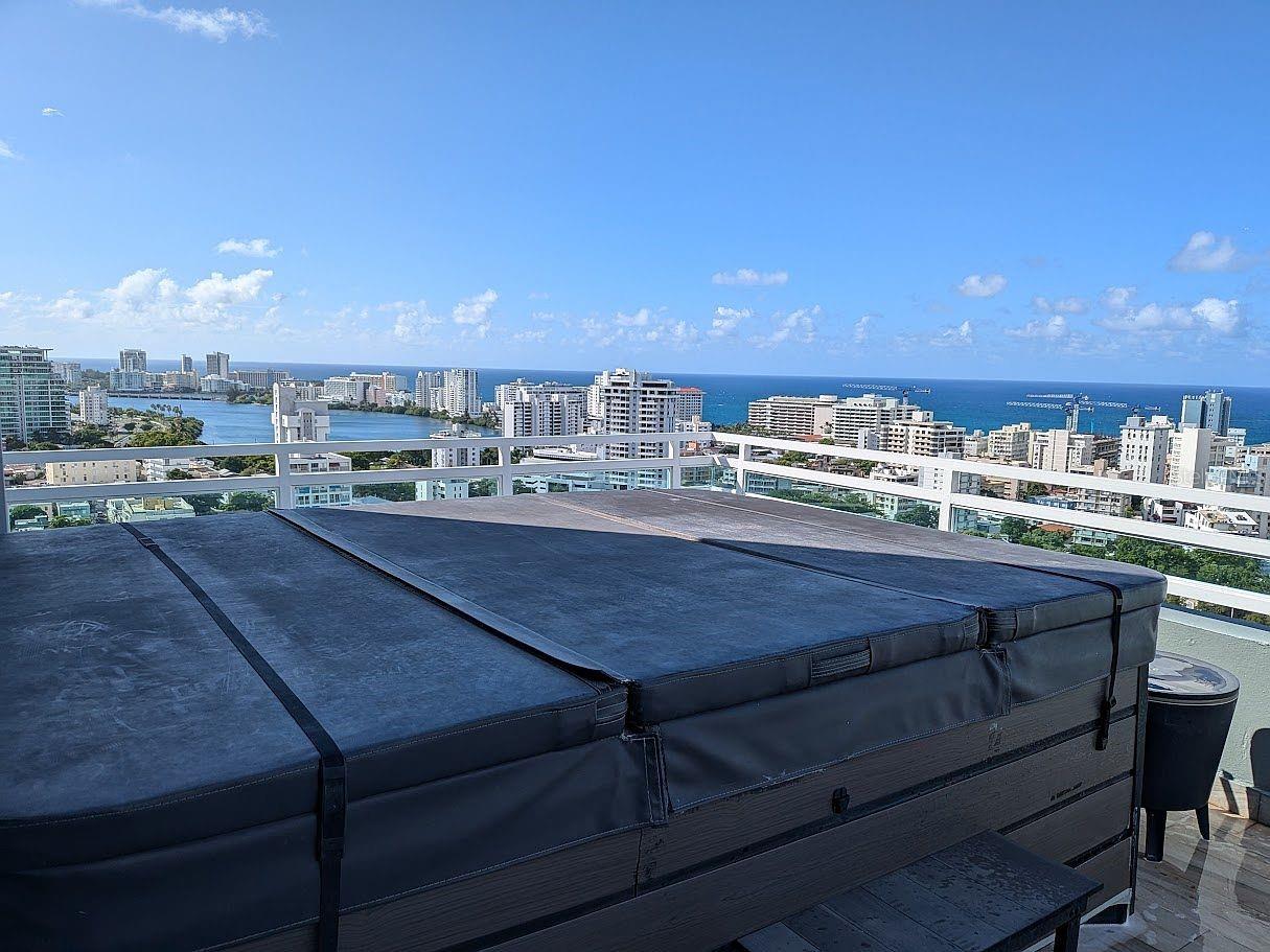 Private terrace  jacuzzi with lagoon and ocean views