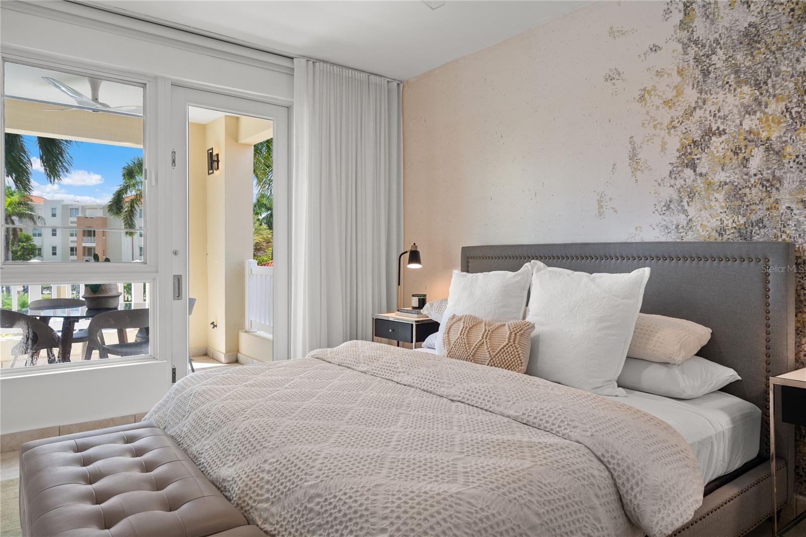 Primary Bedroom with balcony access