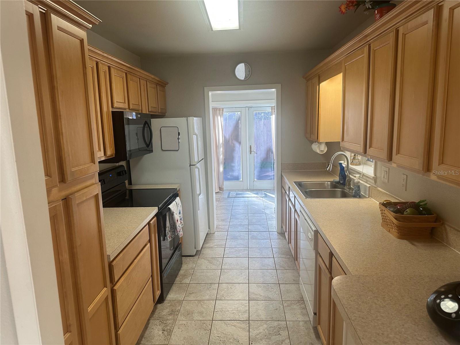 KITCHEN VIEW TO LAUNDRY
