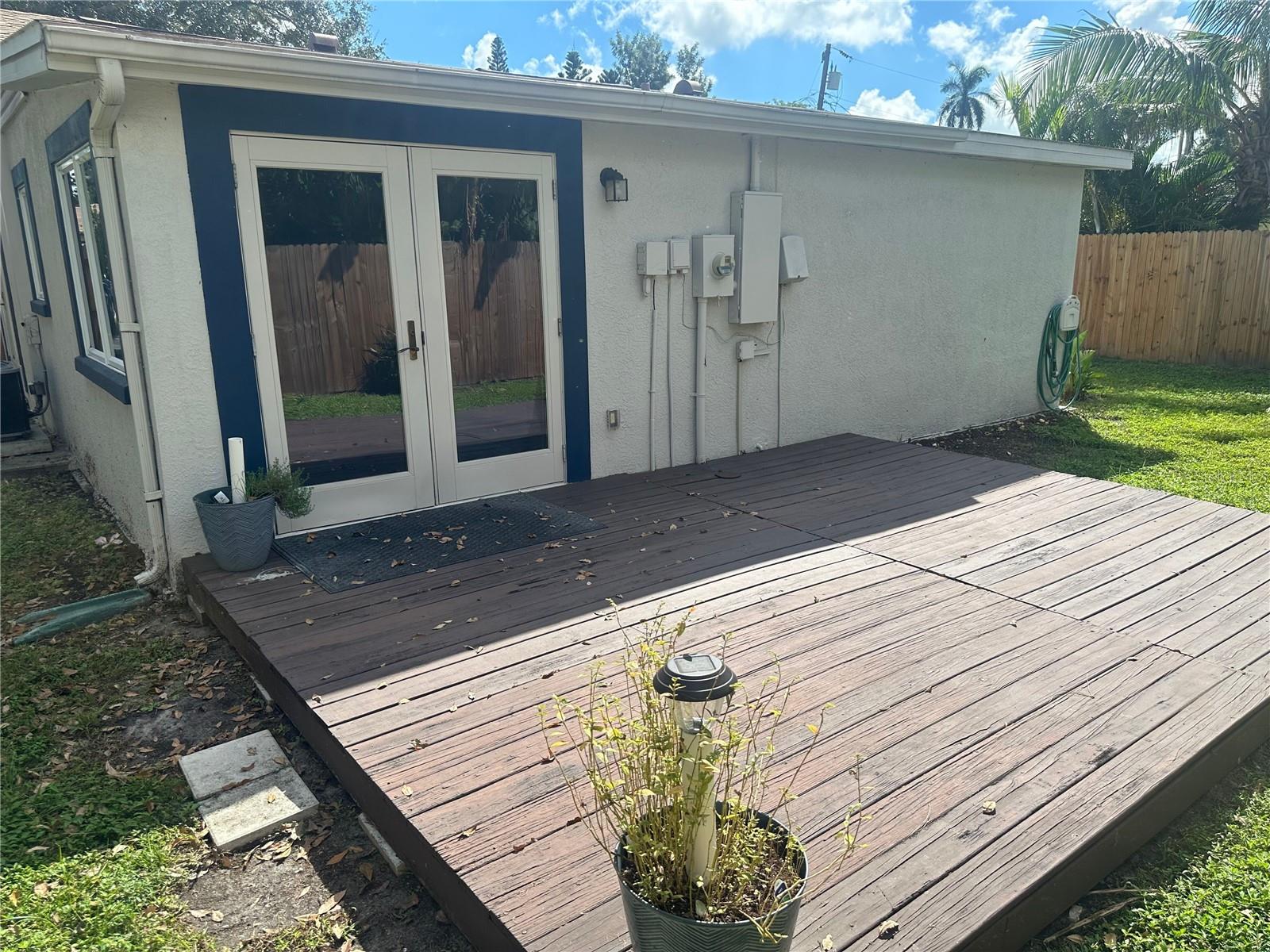 DECK BEHIND HOUSE