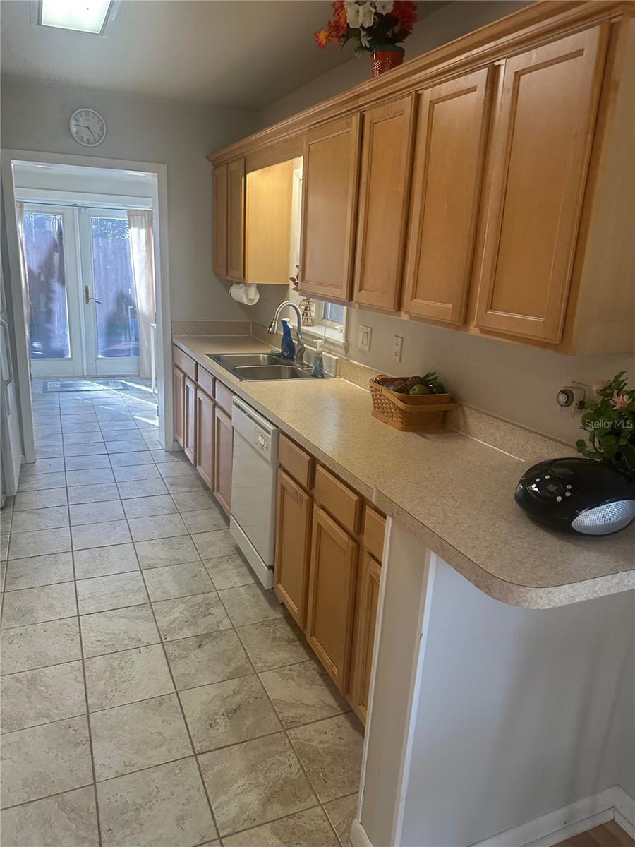 KITCHEN VIEW TO GREAT RM.