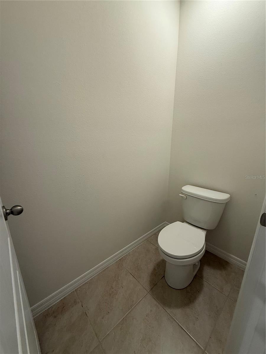 Toilet in primary bathroom