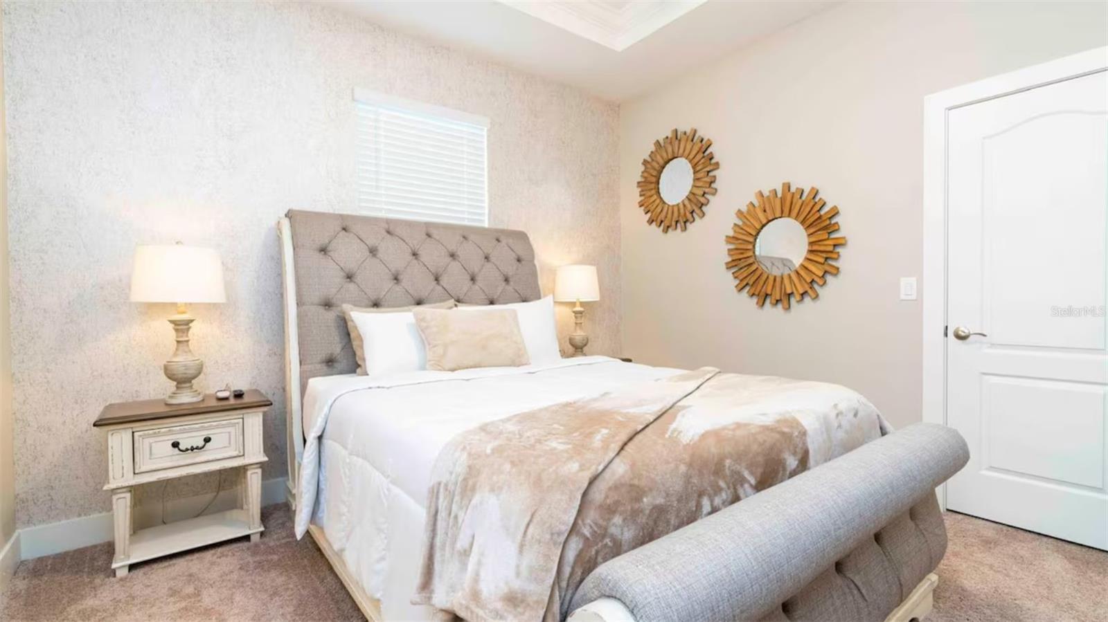Spacious primary suite offering a peaceful retreat for owners or guests.