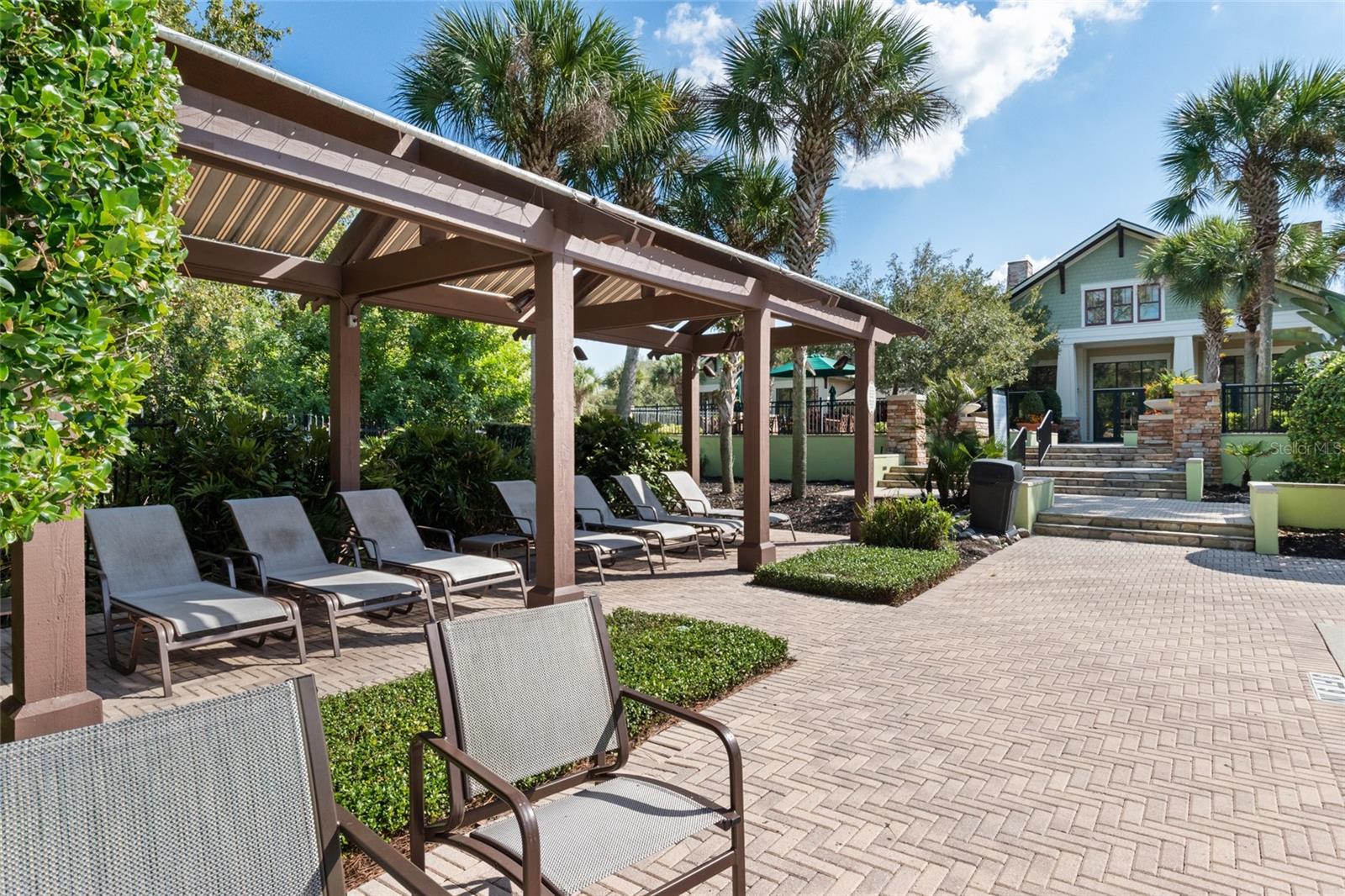 LOUNGE CHAIRS BY THE POOL