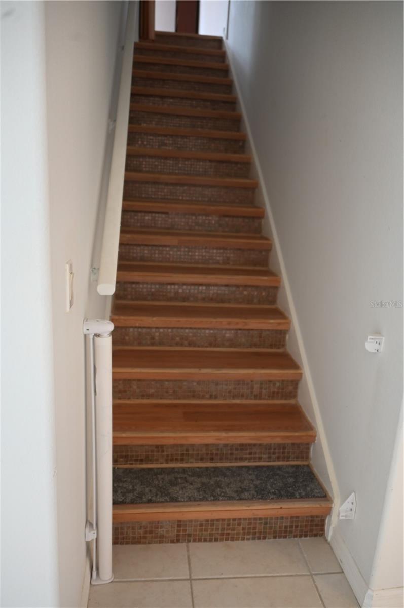 Stairs to the upper private bonus room