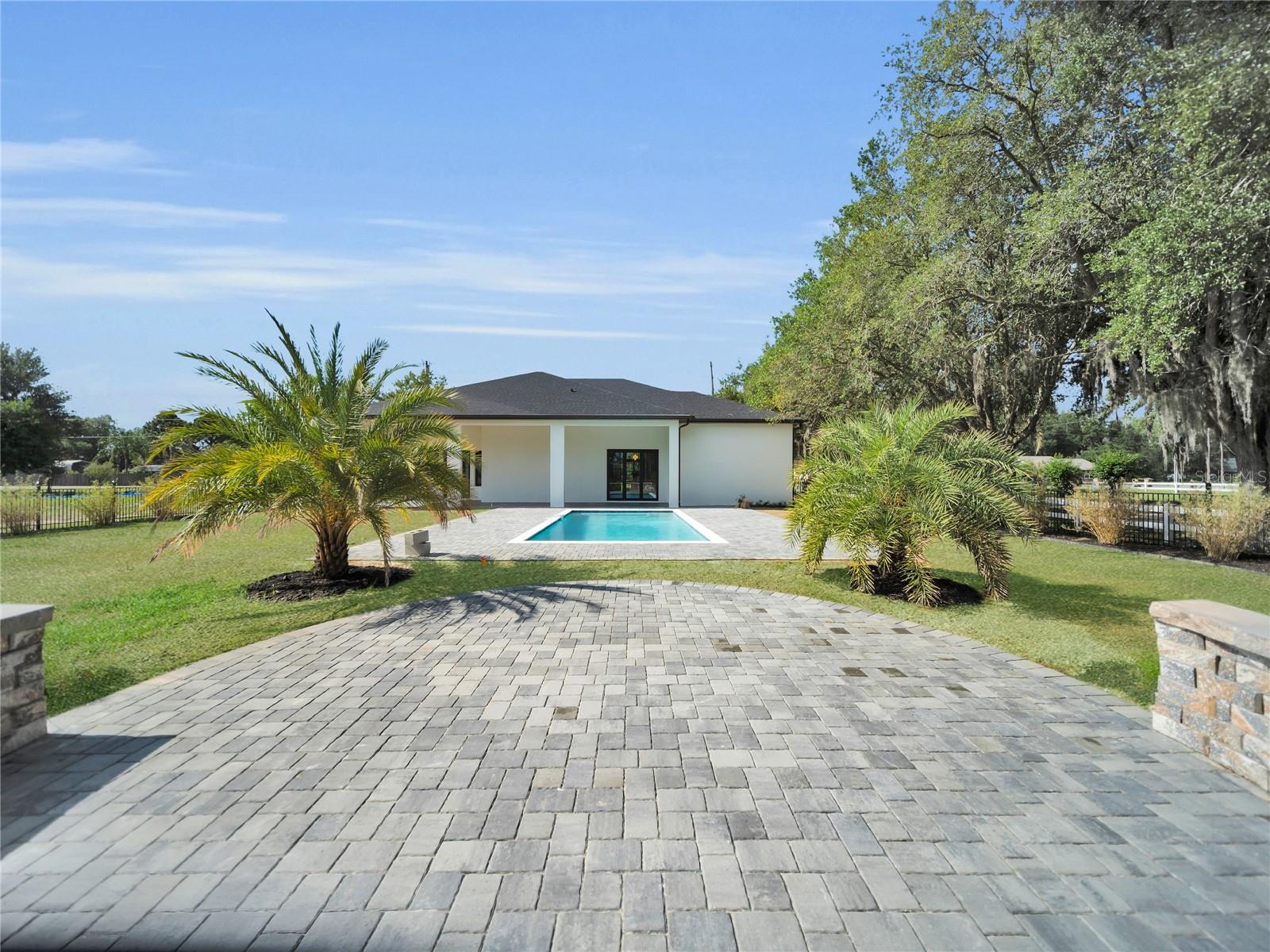 Outdoor entertaining area overlooking pool