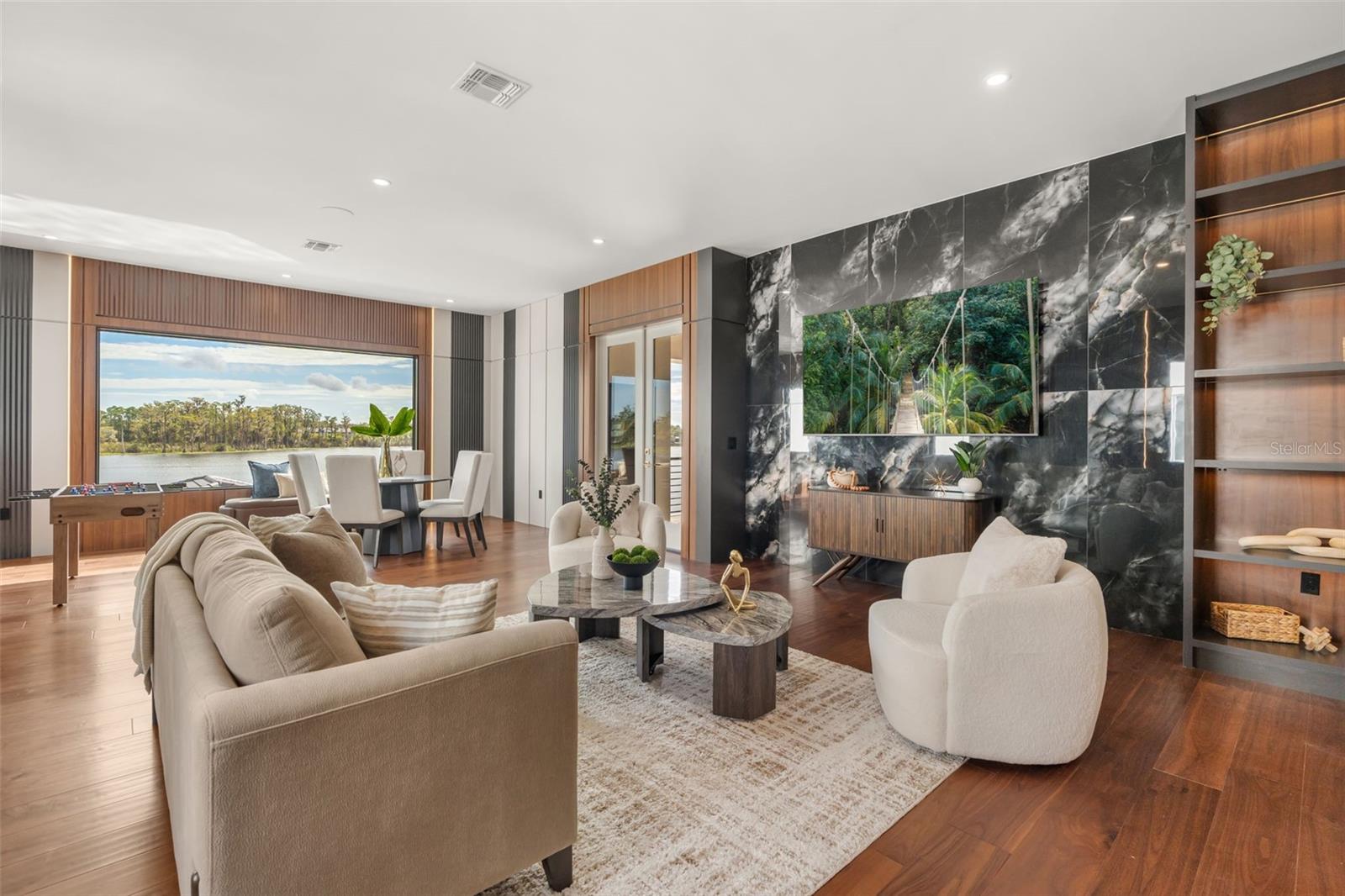Enough space for a pool table or more lounge chairs for movie night