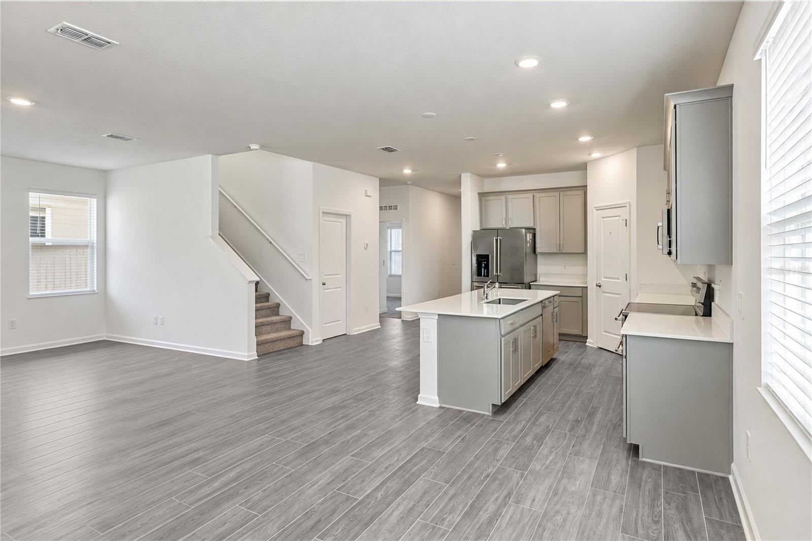 Dinette and Kitchen, Second Floor Stairs and Closet Door Dinette and Kitchen, Second Floor Stairs and Closet Door