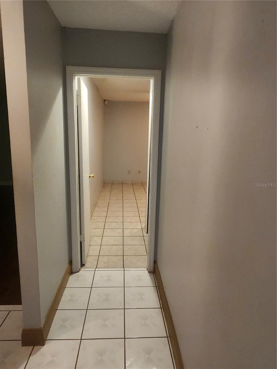 HALLWAY TO PRIMARY BEDROOM