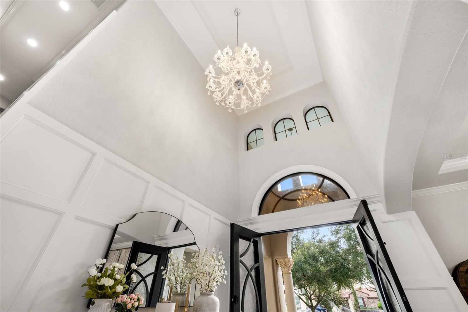 High ceiling with bespoke custom lighting High ceiling with bespoke custom lighting