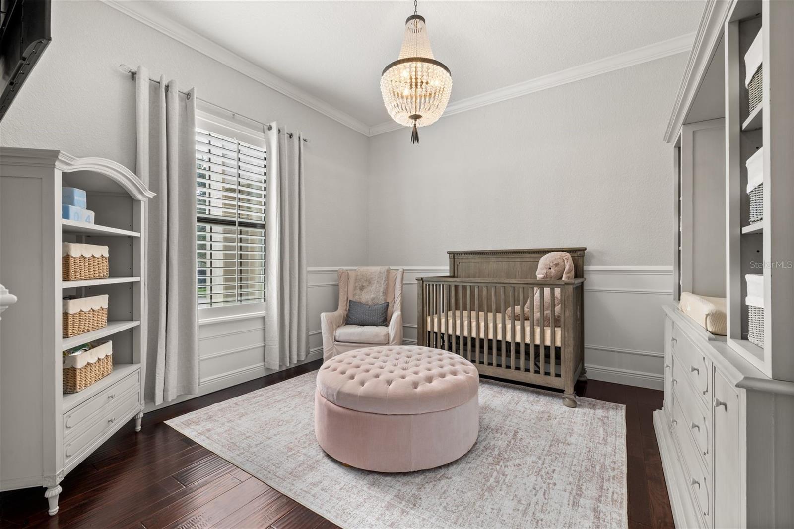 Bedroom 5 (downstairs) which is currently used as a nursery is situated close to the primary bedroom