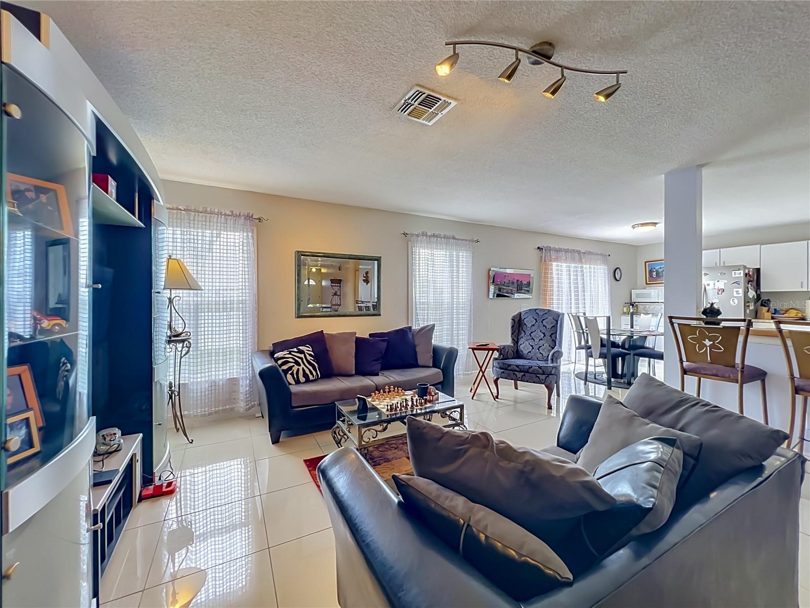 Family room, with dinette area to kitchen