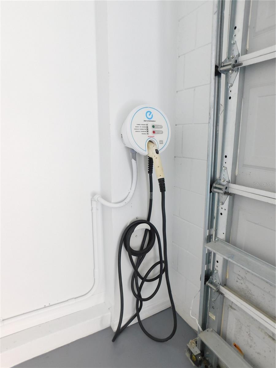 Electric vehicle charging station included