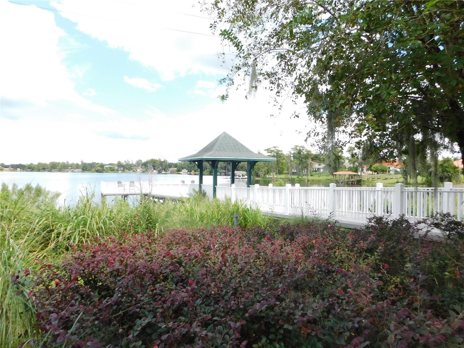 Fishing pier on a beautiful community lake with conservation