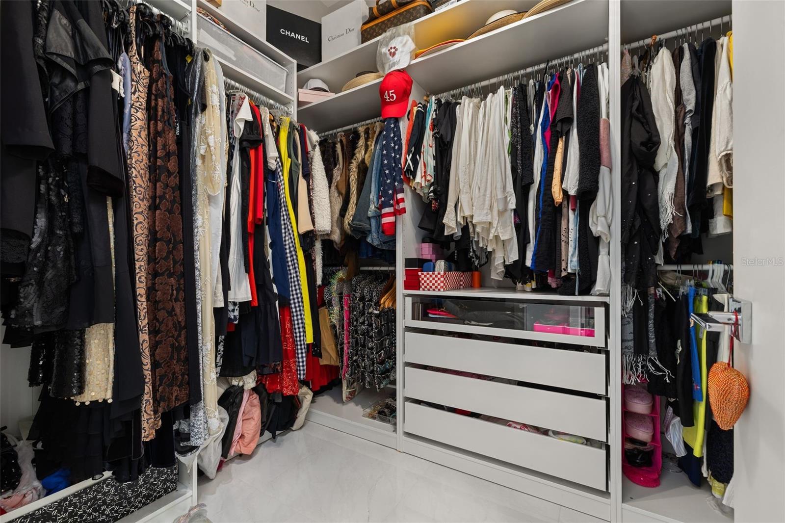 ...her custom fitted walk-in closets