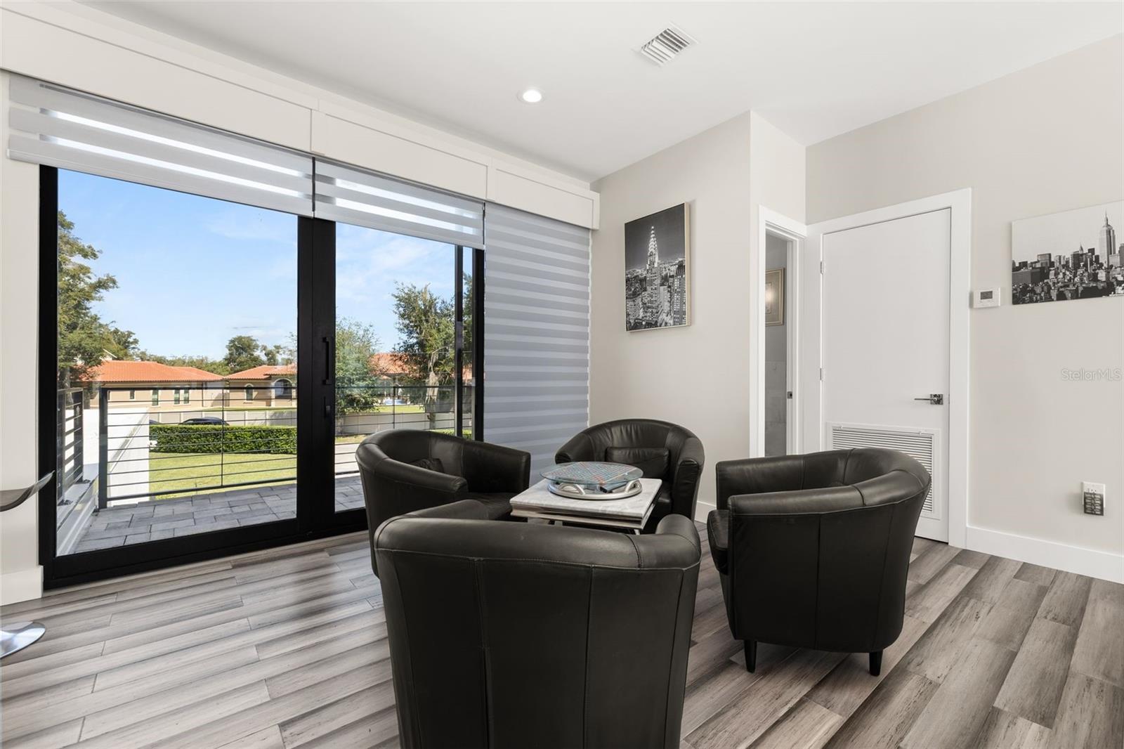 Warm wood flooring throughout upstairs