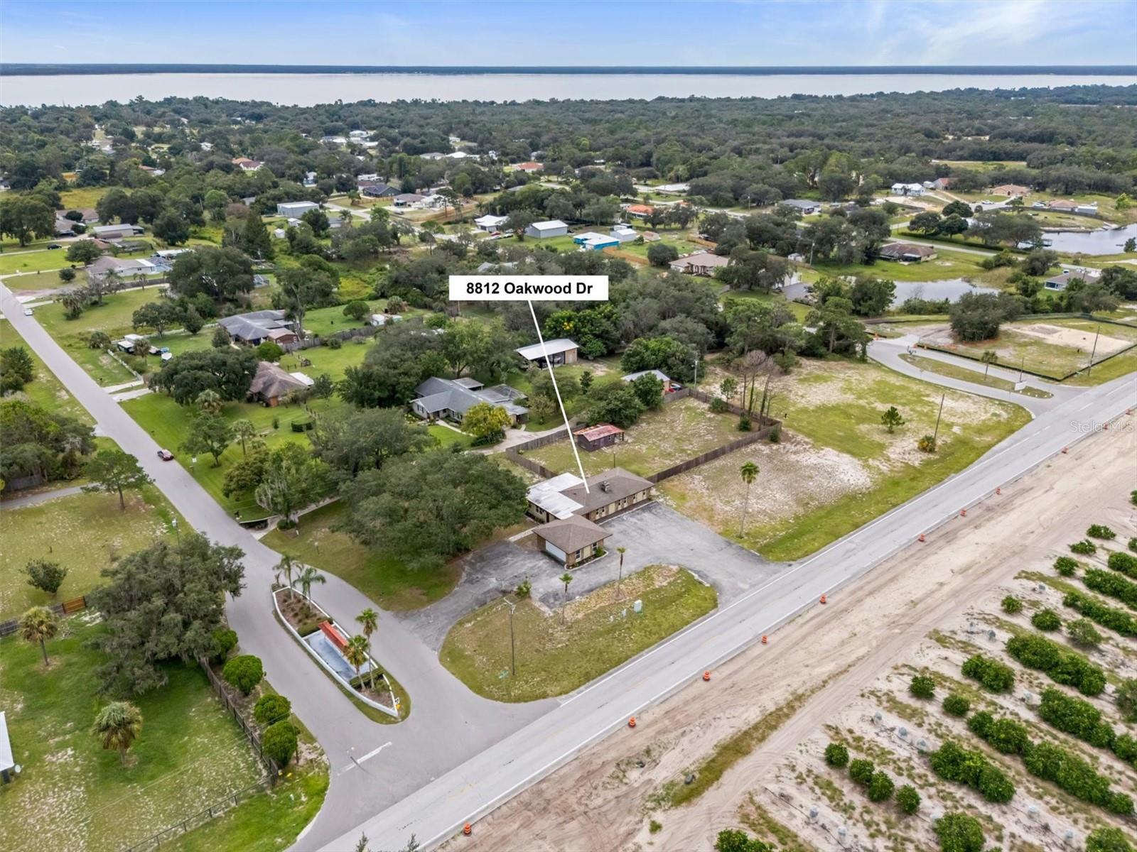 Spacious 1 acre corner lot, with fenced backyard