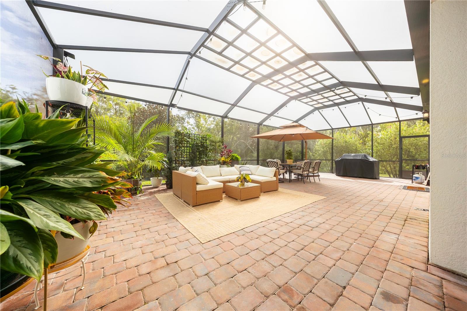 Expansive screened patio with conservation views and potential for a custom pool,