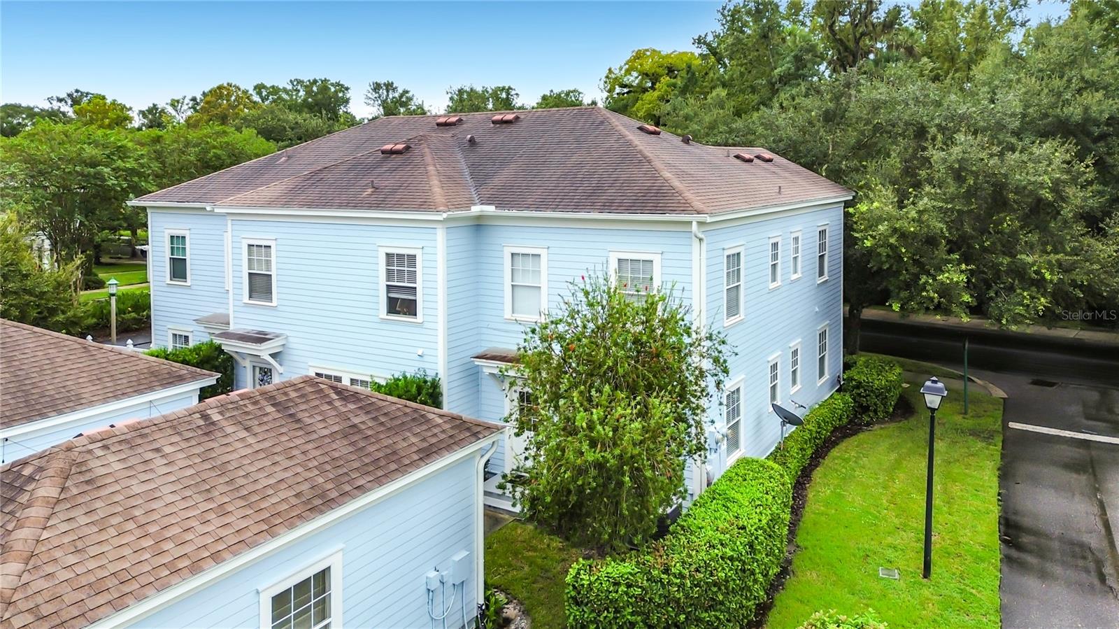 End unit with great side yard!