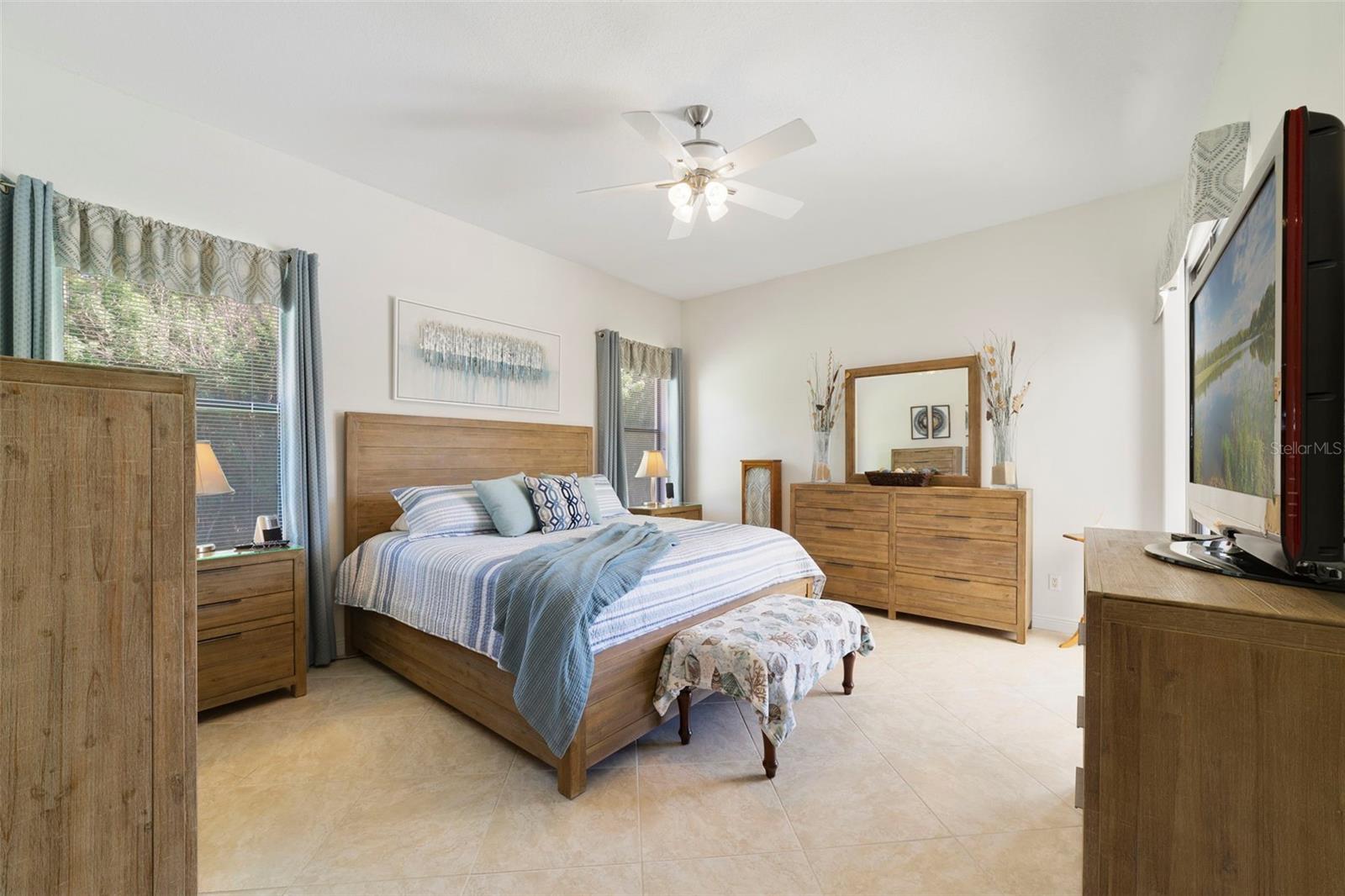Primary Bedroom with sliding glass doors to out back