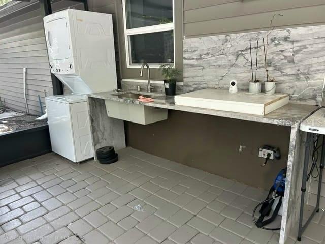 exterior area w/ sink and gas stove
