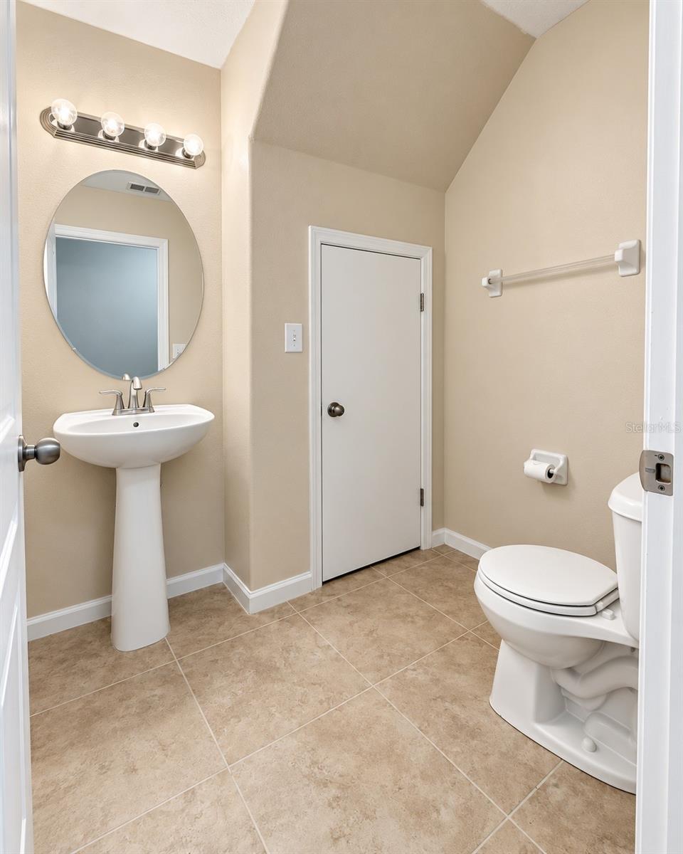 Half Downstairs Bathroom with storage